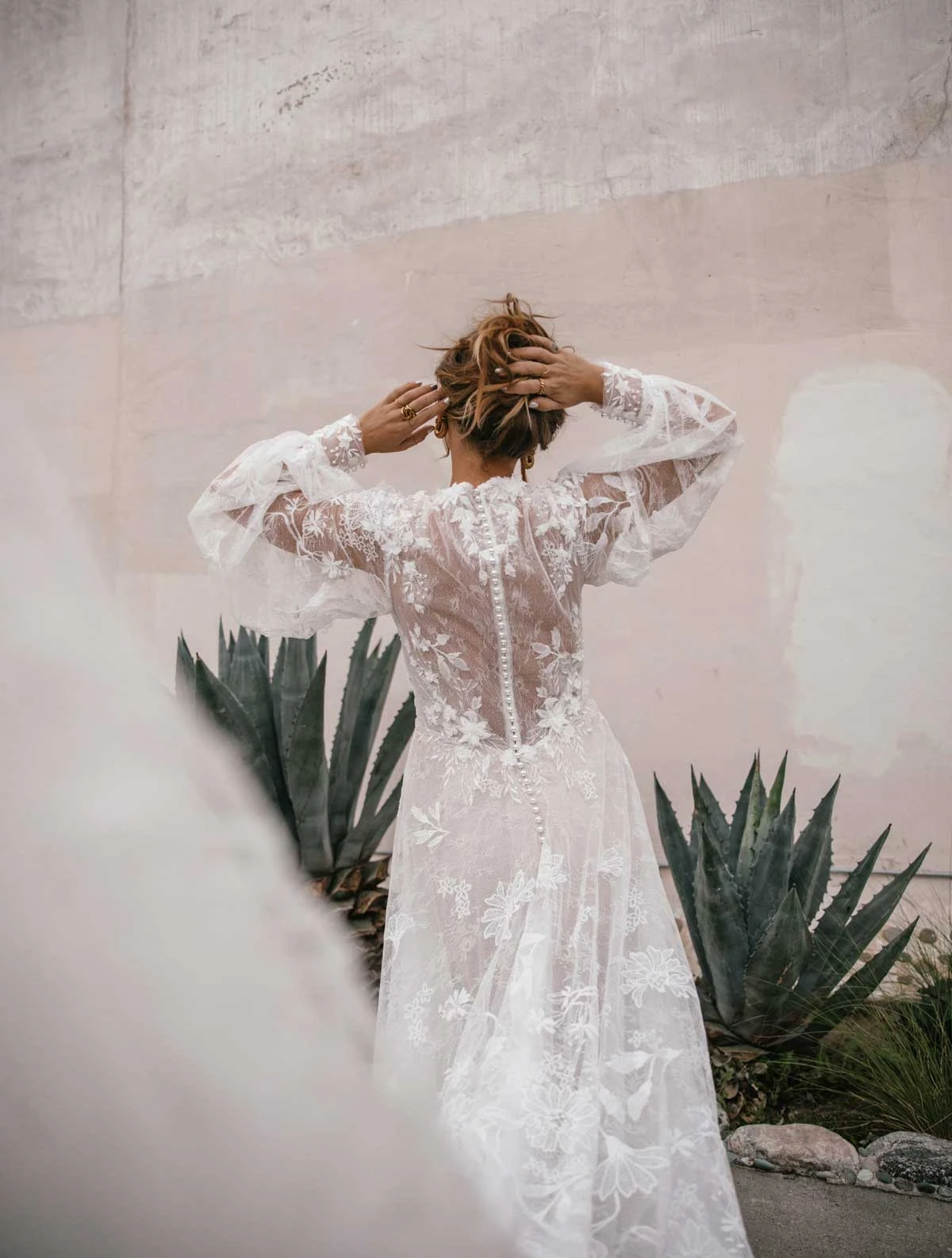 wynter Long Sleeve Lace Boho Wedding Dress with Sheer High Neckline  by All Who Wander