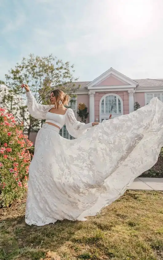 Luxe Two-Piece Boho Bridal Look with Long Bell Sleeves and Detachable Belt, WEST, by All Who Wander
